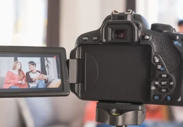 young-couple-talking-to-camera-on-screen-woman-